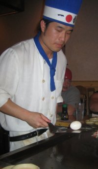 Our chef at Asuka tosses an egg around with the tip of his spatula.