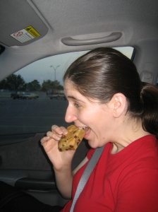Kira, enjoying some sort of chocolate chip cookie bar / brownie thingy from Bloomingfoods.